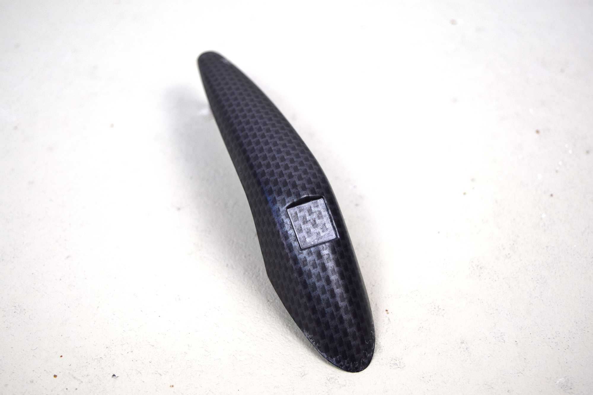 Origineel Vespa sierstuk voor spatbord , carbon