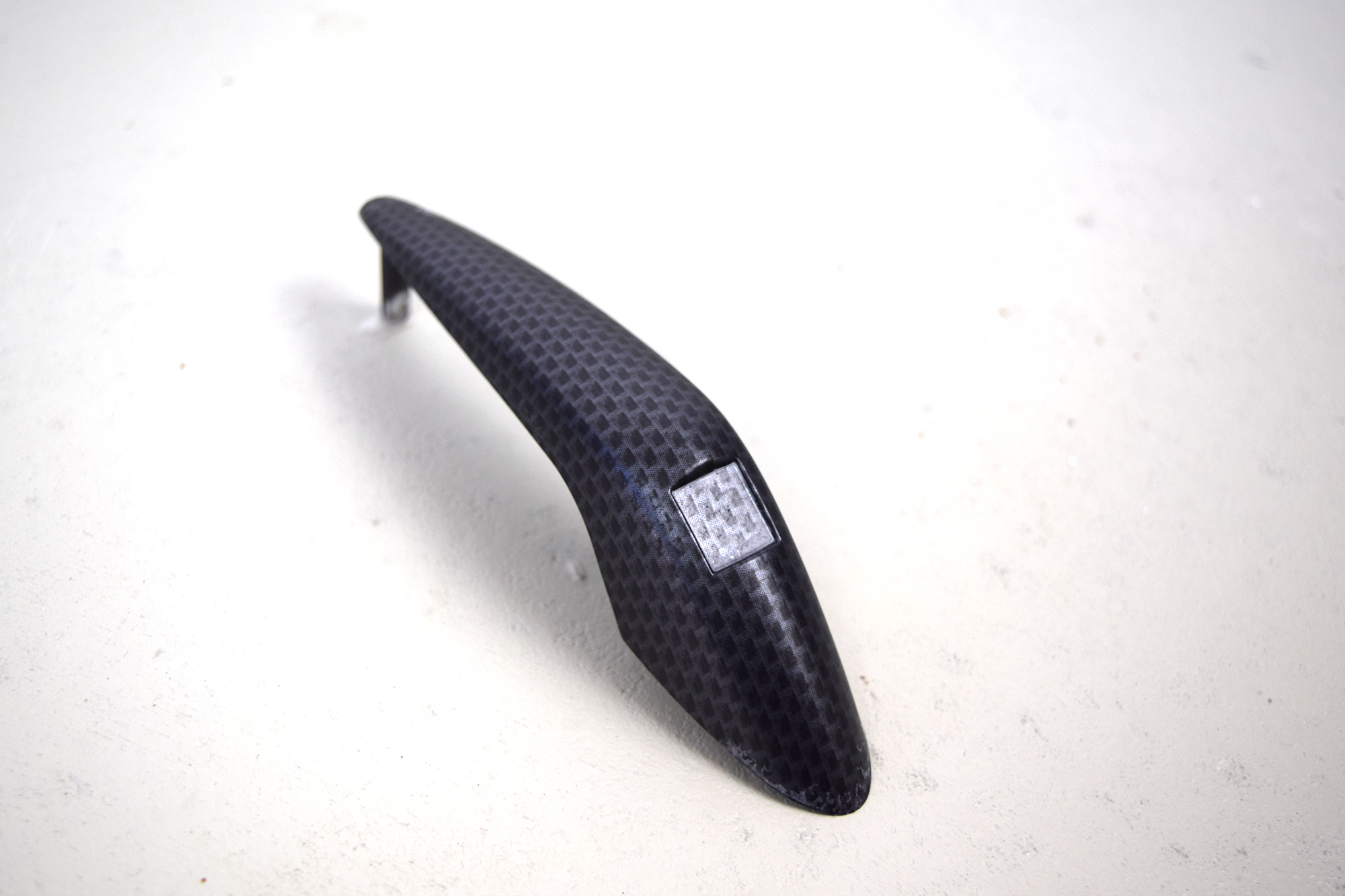 Origineel Vespa sierstuk voor spatbord , carbon